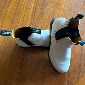 Blundstones !!  Worn a dozen times. Great for rain,mud.